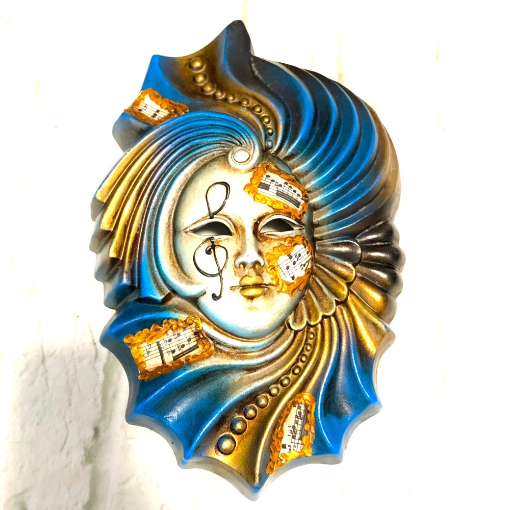 Handmade ceramic mask music harlequin